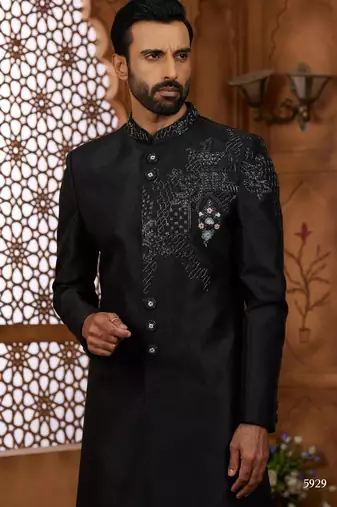 Black classic indo-western sherwani set with handwork on neck & buttons,resham thread, stone & beads work.