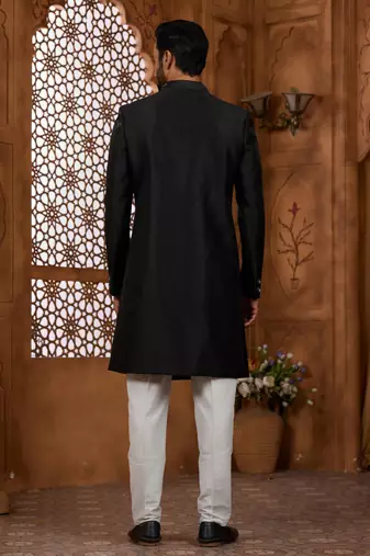 Black classic indo-western sherwani set with handwork on neck & buttons,resham thread, stone & beads work.