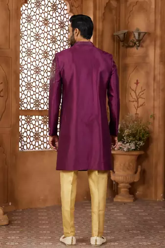 Purple classic indo-western sherwani set with handwork on neck & buttons,resham thread, stone & beads work.