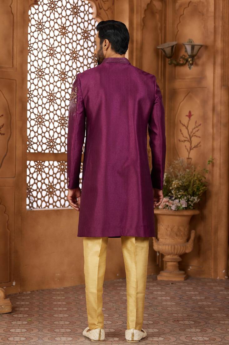Purple classic indo-western sherwani set with handwork on neck & buttons,resham thread, stone & beads work.