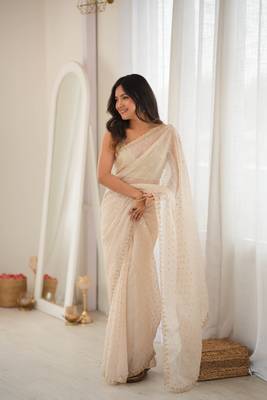 Cream chiffon zari embroidered saree with unstitched blouse piece. 2