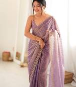Lilac chiffon zari embroidered saree with unstitched blouse piece.