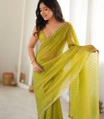Neon chiffon zari embroidered saree with unstitched blouse piece.