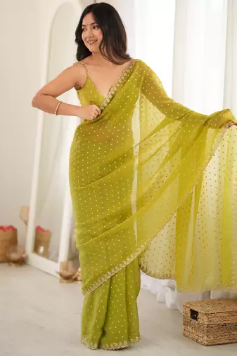 Neon chiffon zari embroidered saree with unstitched blouse piece.