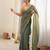 Olive chiffon zari embroidered saree with unstitched blouse piece.
