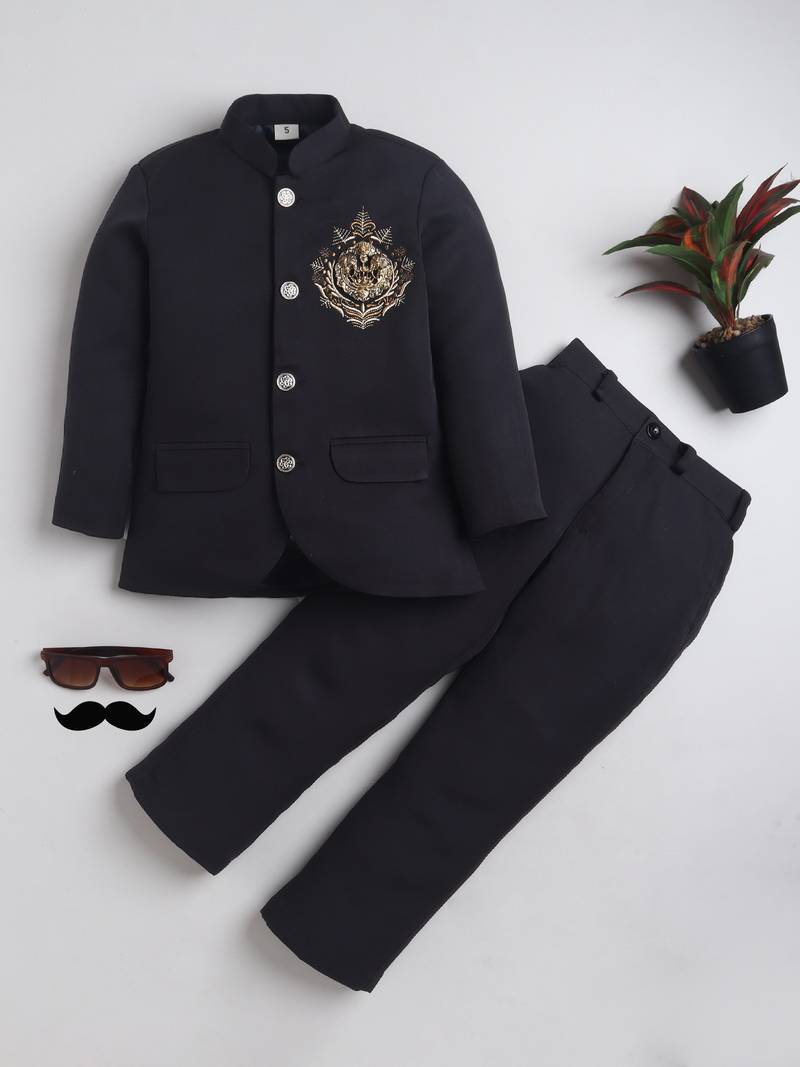 Boys black lycra floral embroidered bandhgala blazer & trouser set with metal crest
