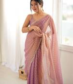 Onion chiffon zari embroidered saree with unstitched blouse piece.