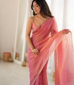 Pink chiffon zari embroidered saree with unstitched blouse piece.