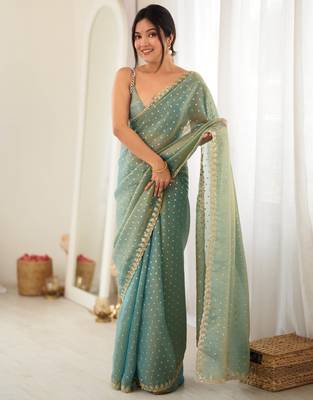 Rama chiffon zari embroidered saree with unstitched blouse piece. 2