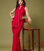 Red georgette sequins saree with unstitched blouse piece.