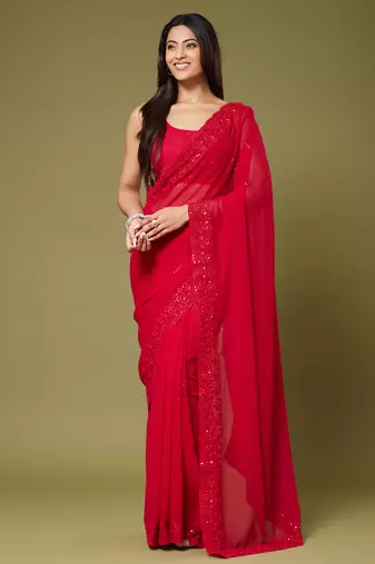 Red georgette sequins saree with unstitched blouse piece.