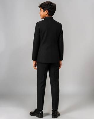 Boys black lycra solid indo-western blazer & trouser set with elephant brooch 2