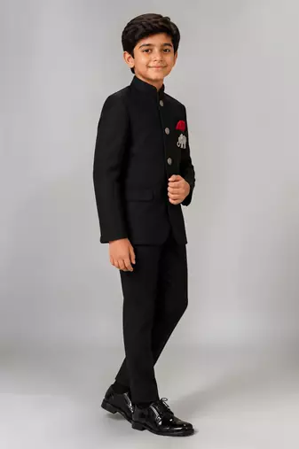 Boys black lycra solid indo-western blazer & trouser set with elephant brooch