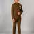 Boys brown lycra solid indo-western blazer & trouser set with elephant brooch