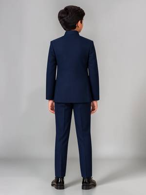 Boys navy blue lycra solid indo-western blazer & trouser set with elephant brooch 2