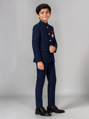 Boys navy blue lycra solid indo-western blazer & trouser set with elephant brooch 5