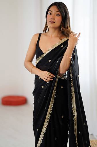 Black tissue satin sequins saree with unstitched blouse piece.
