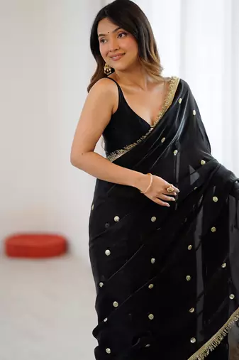 Black tissue satin sequins saree with unstitched blouse piece.