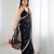 Black tissue satin sequins saree with unstitched blouse piece.