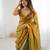 Gold tissue satin sequins saree with unstitched blouse piece.