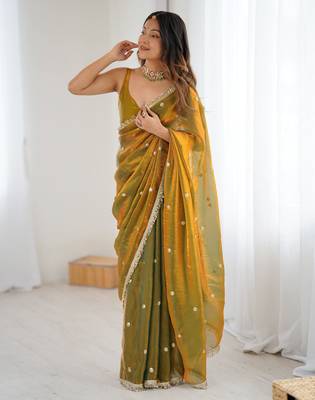 Gold tissue satin sequins saree with unstitched blouse piece. 2