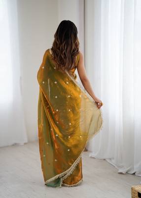 Gold tissue satin sequins saree with unstitched blouse piece. 4