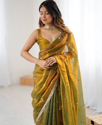 Gold tissue satin sequins saree with unstitched blouse piece. 5