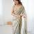 Grey tissue satin sequins saree with unstitched blouse piece.