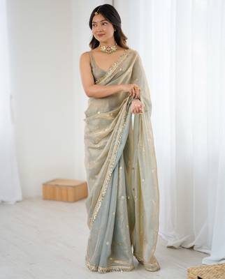 Grey tissue satin sequins saree with unstitched blouse piece. 2
