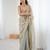 Grey tissue satin sequins saree with unstitched blouse piece.