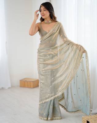 Grey tissue satin sequins saree with unstitched blouse piece. 3