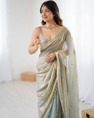 Grey tissue satin sequins saree with unstitched blouse piece. 4