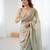 Grey tissue satin sequins saree with unstitched blouse piece.