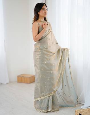 Grey tissue satin sequins saree with unstitched blouse piece. 5