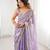 Lilac tissue satin sequins saree with unstitched blouse piece.