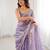 Lilac tissue satin sequins saree with unstitched blouse piece.