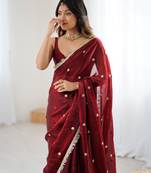 Maroon tissue satin sequins saree with unstitched blouse piece.