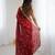 Maroon tissue satin sequins saree with unstitched blouse piece.