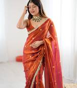 Orange tissue satin sequins saree with unstitched blouse piece.