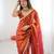 Orange tissue satin sequins saree with unstitched blouse piece.