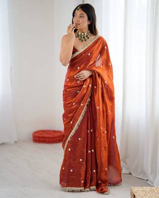 Orange tissue satin sequins saree with unstitched blouse piece. 2