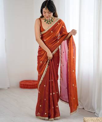 Orange tissue satin sequins saree with unstitched blouse piece. 3