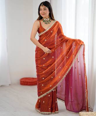 Orange tissue satin sequins saree with unstitched blouse piece. 4