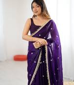 Purple tissue satin sequins saree with unstitched blouse piece.
