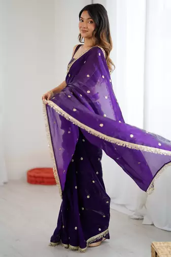 Purple tissue satin sequins saree with unstitched blouse piece.