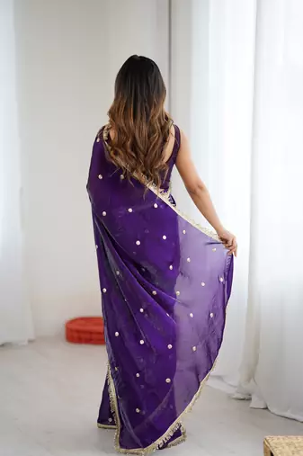 Purple tissue satin sequins saree with unstitched blouse piece.