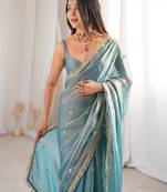 Sky blue tissue satin sequins saree with unstitched blouse piece.