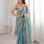 Sky blue tissue satin sequins saree with unstitched blouse piece.