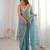 Sky blue tissue satin sequins saree with unstitched blouse piece.