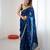 Teal tissue satin sequins saree with unstitched blouse piece.